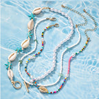 Fashionable Asymmetrical Shell Bead Cross Necklace
