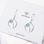 Cat-Inspired Earrings with Synthetic Moonstone Design