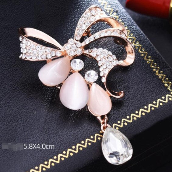 Fashion Bowknot Crystal Brooch with Blue Drop