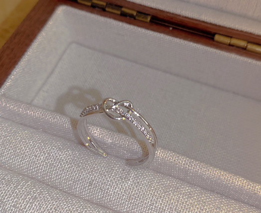 Winding Cross Ring with Micro Inlaid Zircon Design