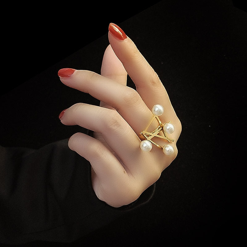 Cross Symbol Pearl Fashion Ring in Magazine Style