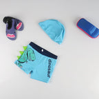 Boys Cartoon Dinosaur Swim Trunks and Cap Set