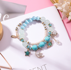 Multi-Layer Bracelet with Star, Moon, and Cat Eye Crystals